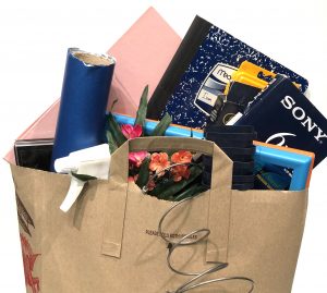 Large paper bag filled with supplies