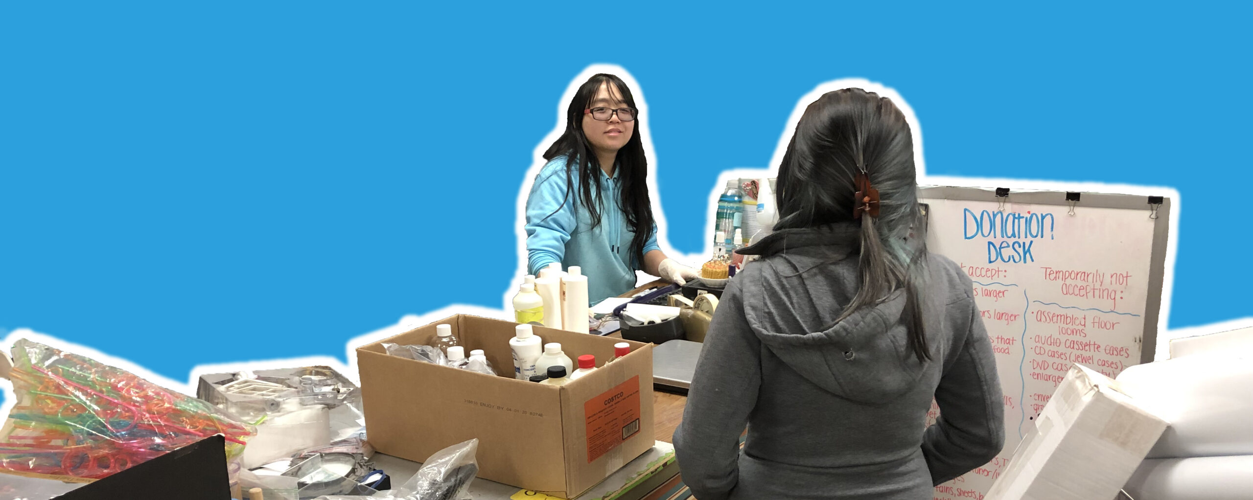 Staff member at the donation desk