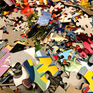 A pile of puzzle pieces.