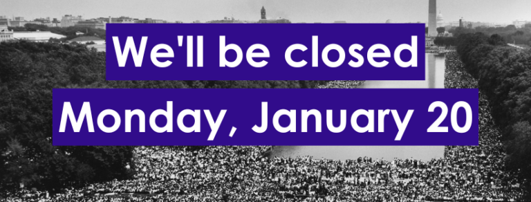 Black and white photo of people on the National Mall behind white text surrounded by blue rectangles.